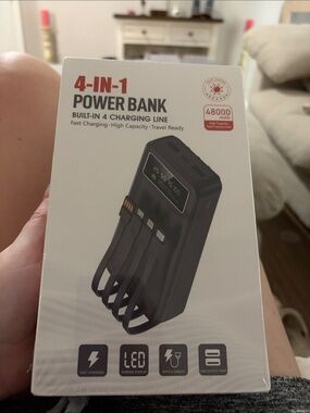 4-in-1 Black Power Bank with Built-In Charging Cables